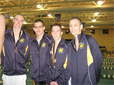 Greg Porch, Kevin Bohland, Tommy Petro and Aidan Burton receive their medal at SWC, and took over 4 seconds off the 400 Freestyle Relay Record(2003).  